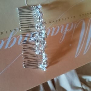 A wedding dress with the comb and the shoes